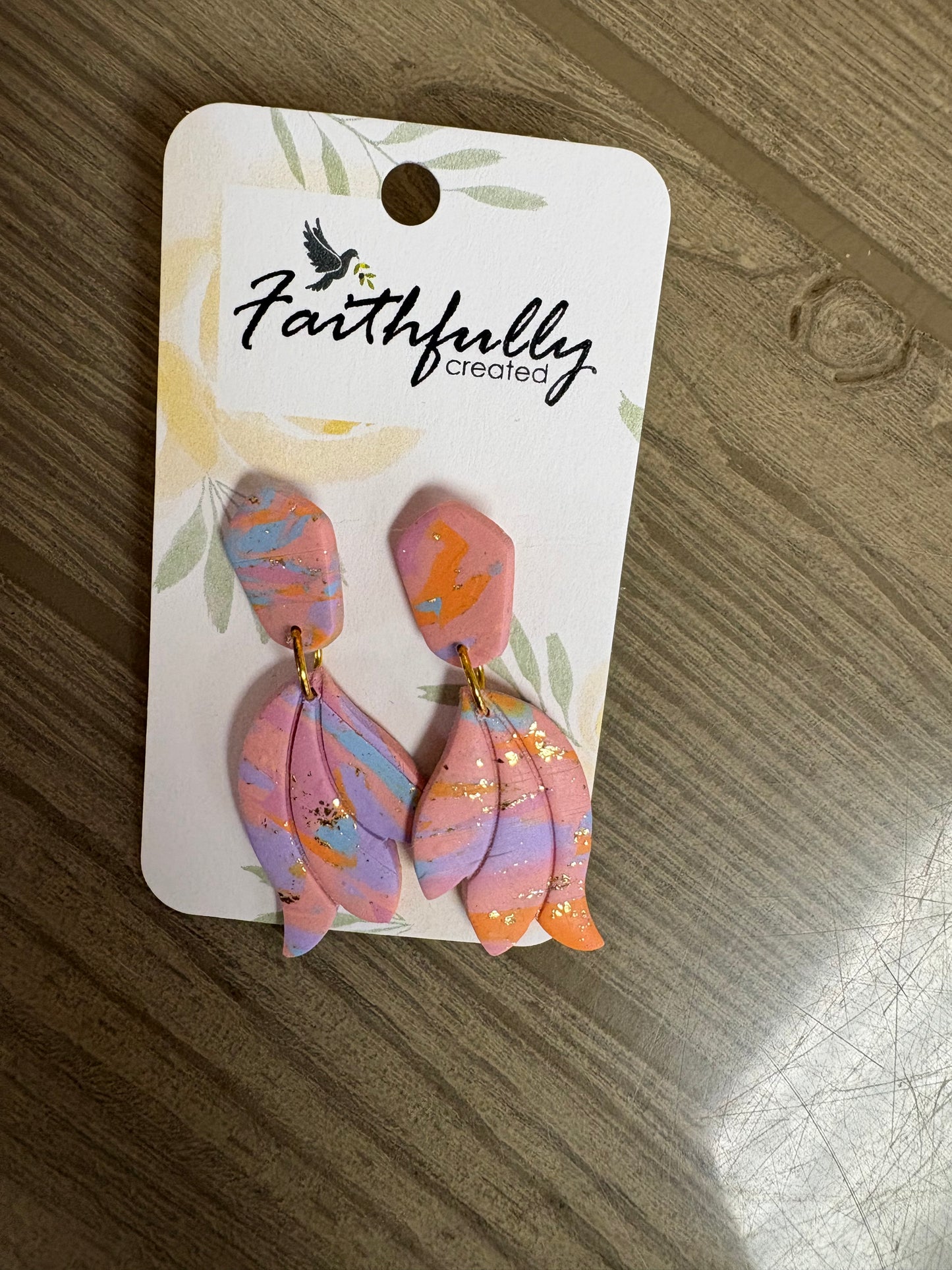 EARRINGS: TYE DYED FEATHERS